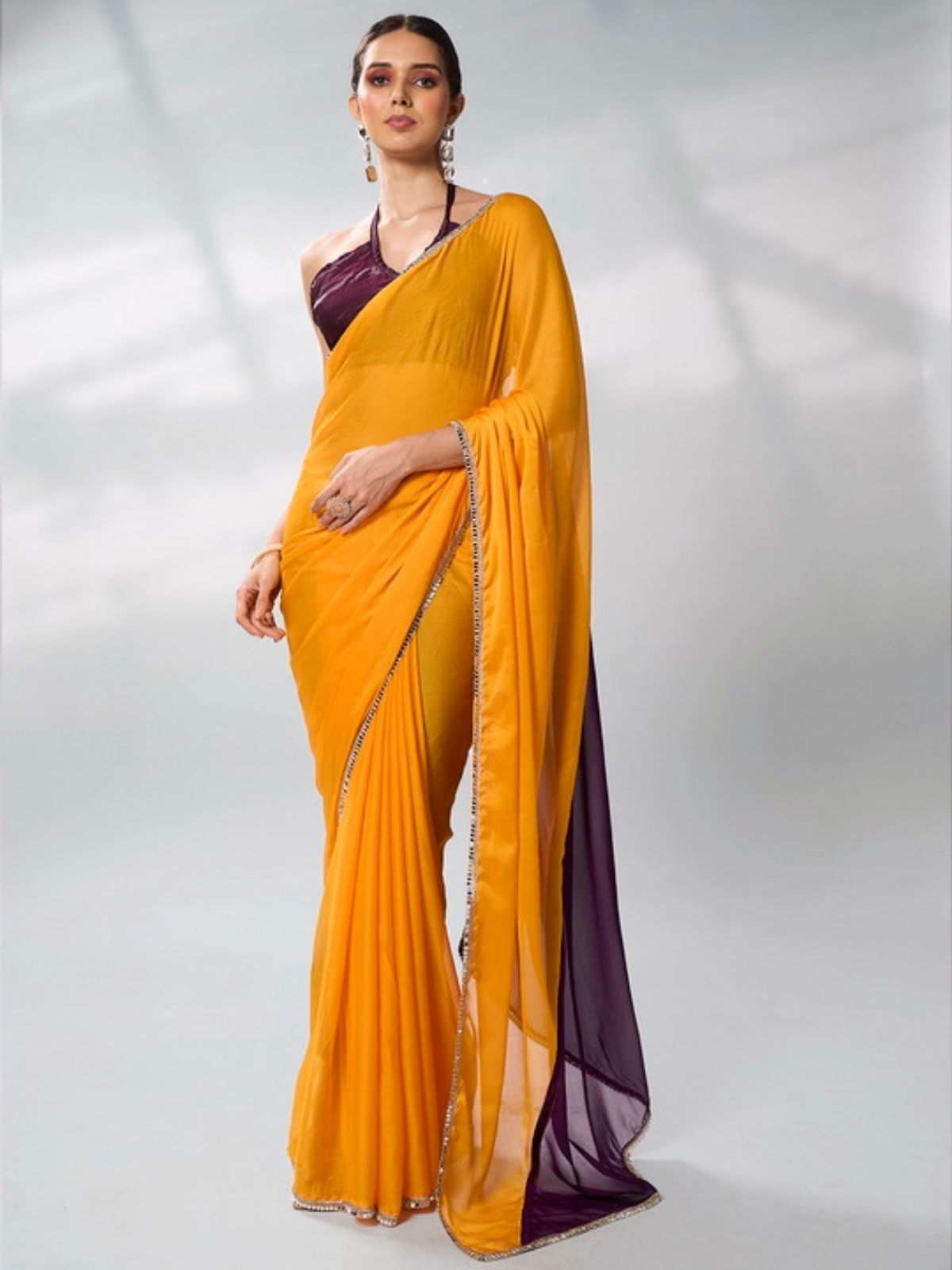 Odette Mustard And Purple Georgette Lace Work Saree With Unstitched Blouse For Women