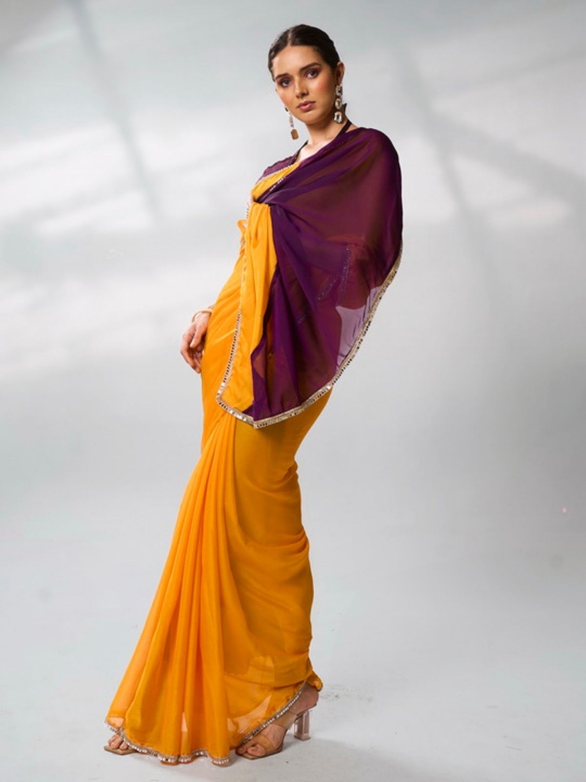 Odette Mustard And Purple Georgette Lace Work Saree With Unstitched Blouse For Women