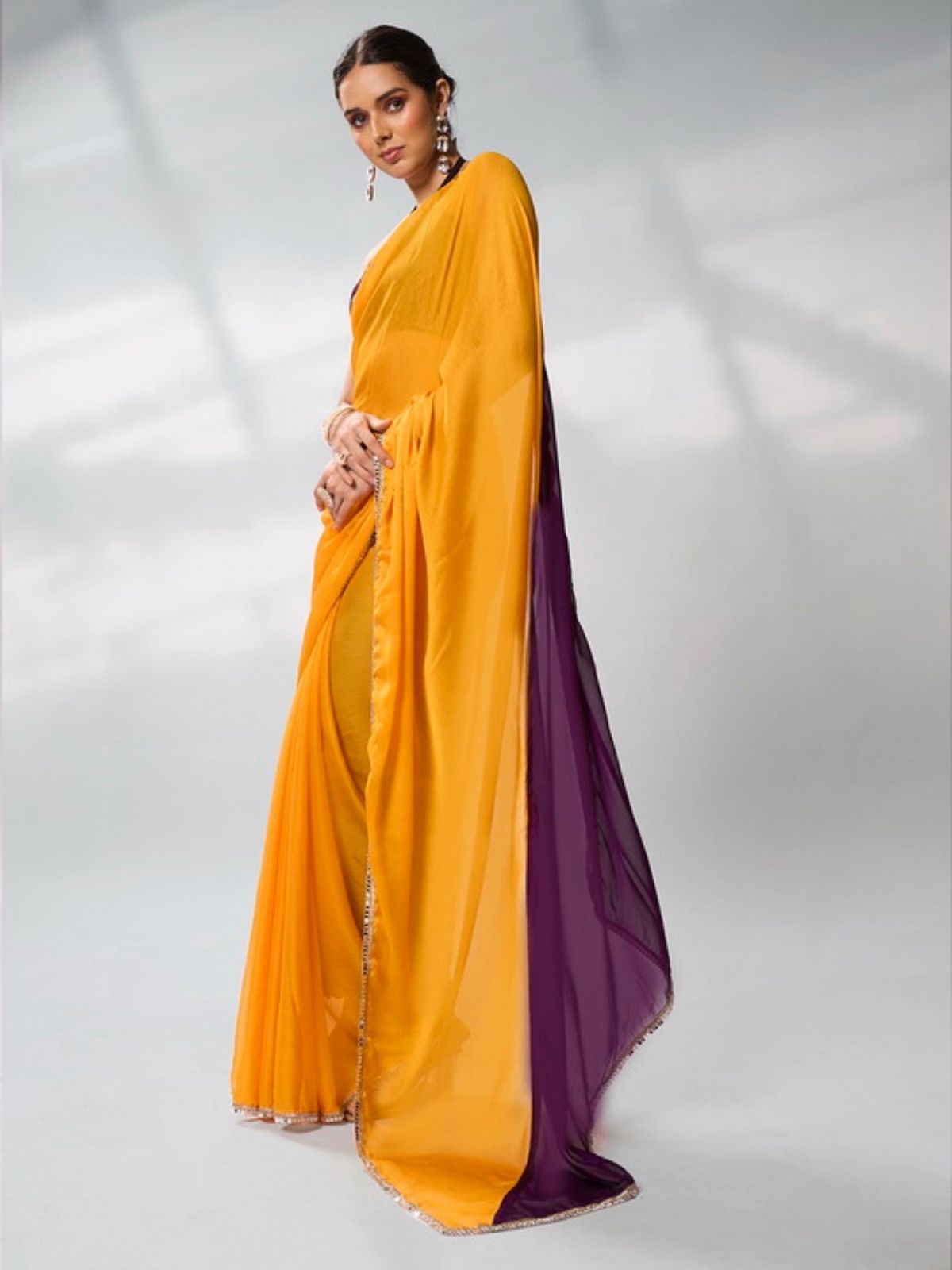 Odette Mustard And Purple Georgette Lace Work Saree With Unstitched Blouse For Women