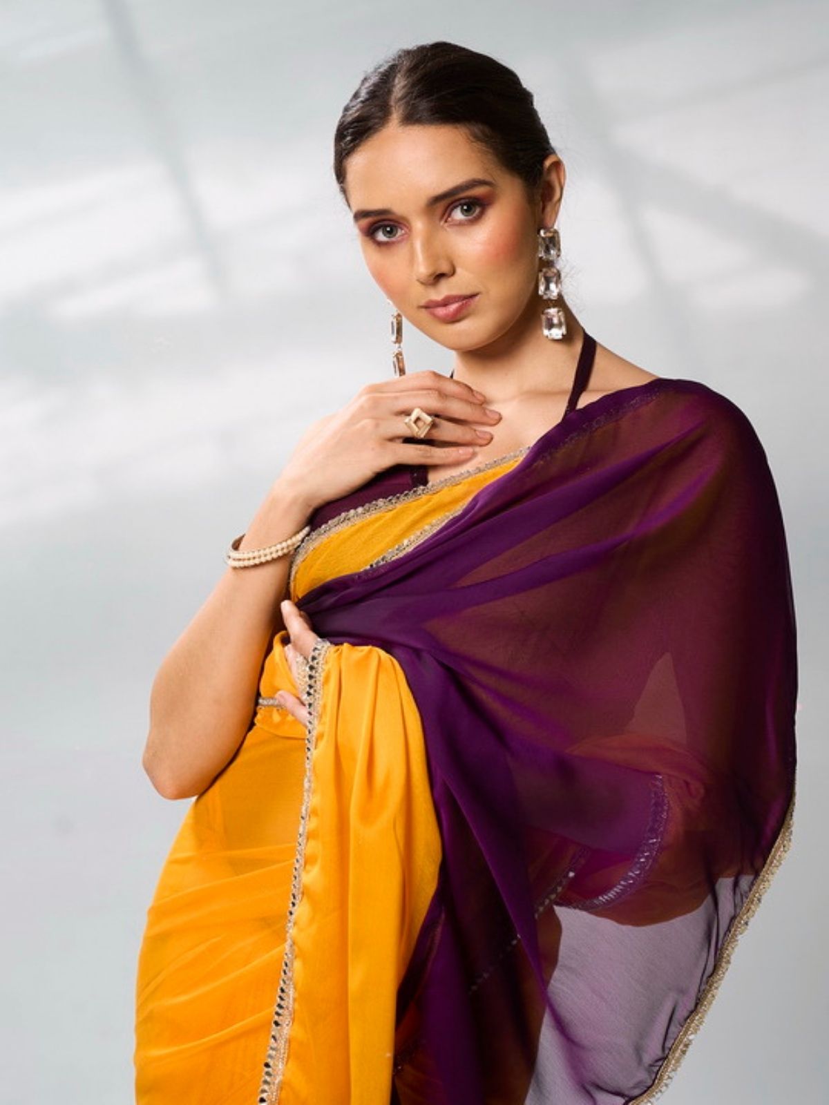 Odette Mustard And Purple Georgette Lace Work Saree With Unstitched Blouse For Women