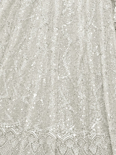 Odette White Soft Net Embellished Semi-Stitched Lehenga With Unstitched Blouse For Women