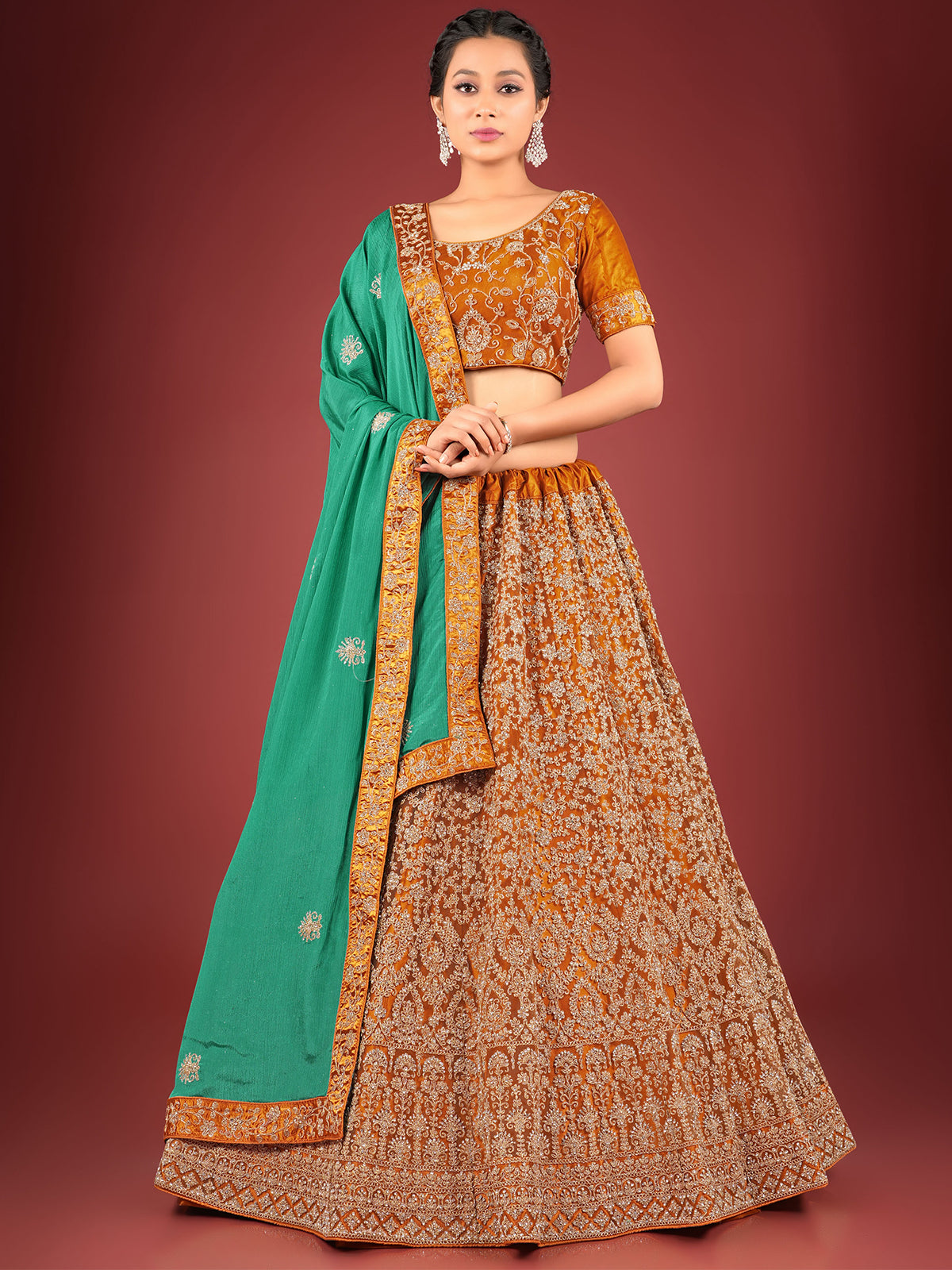 Odette Women Mustard Net Embroidered Semi Stitched Lehenga With Unstitched Blouse