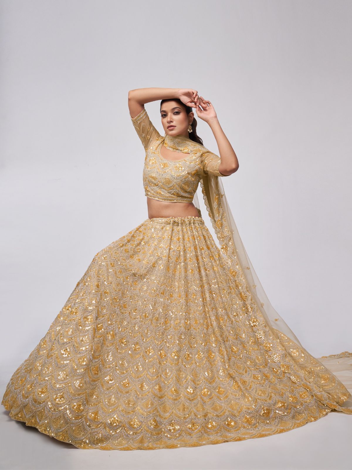 Odette Golden Soft Net Embroidered Semi Stitched Lehenga With Unstitched Blouse For Women