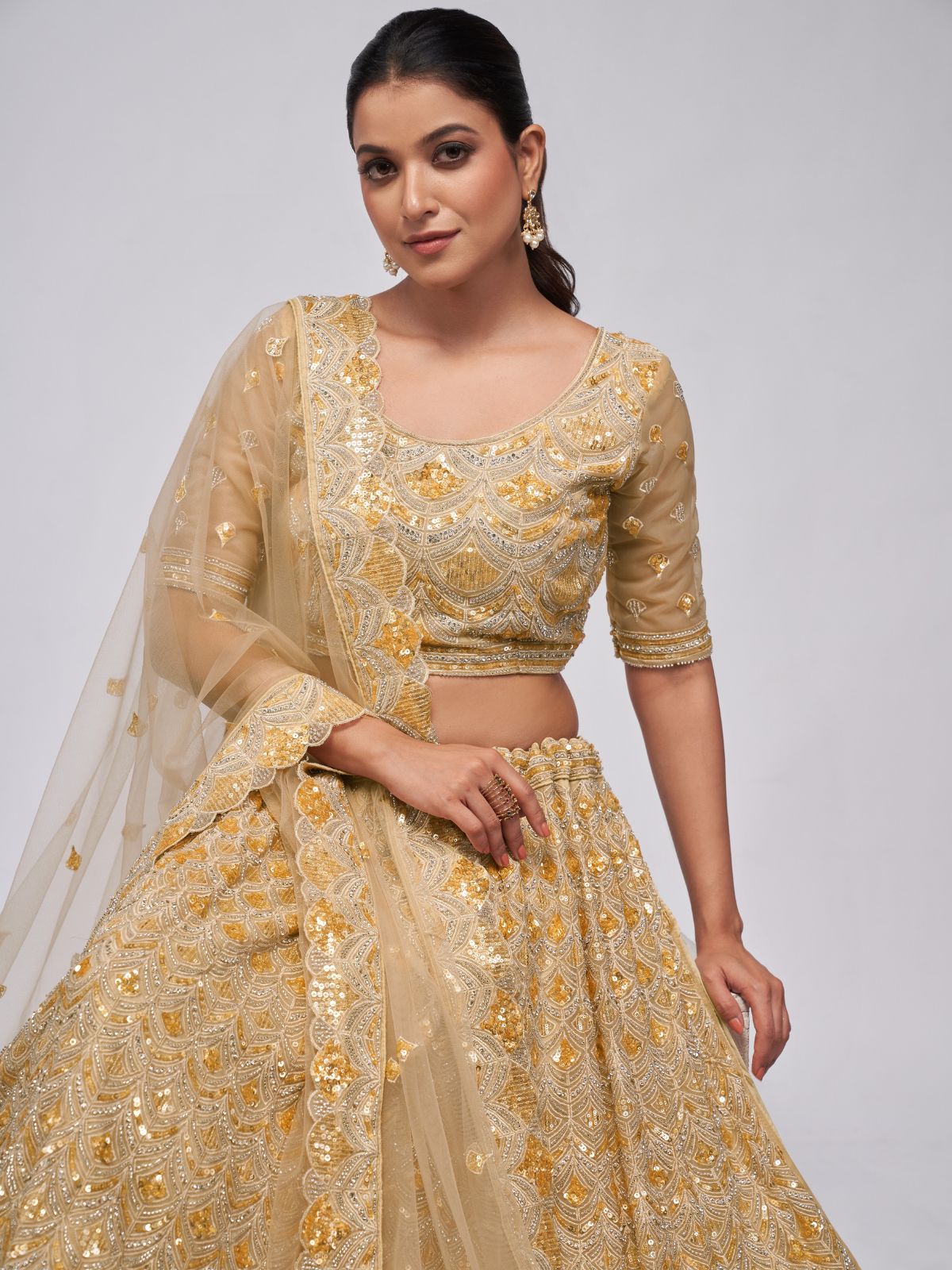 Odette Golden Soft Net Embroidered Semi Stitched Lehenga With Unstitched Blouse For Women