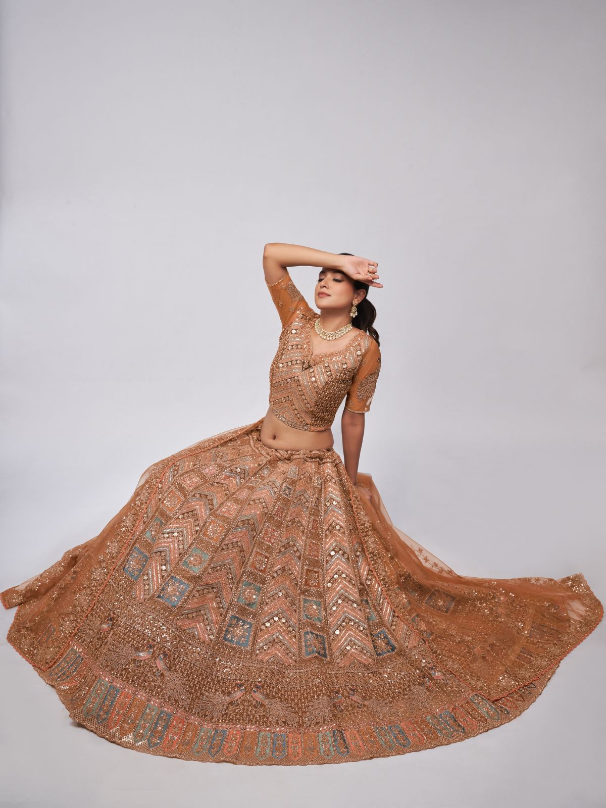 Odette Rust Color Soft Net Embroidered Semi Stitched Lehenga With Unstitched Blouse For Women