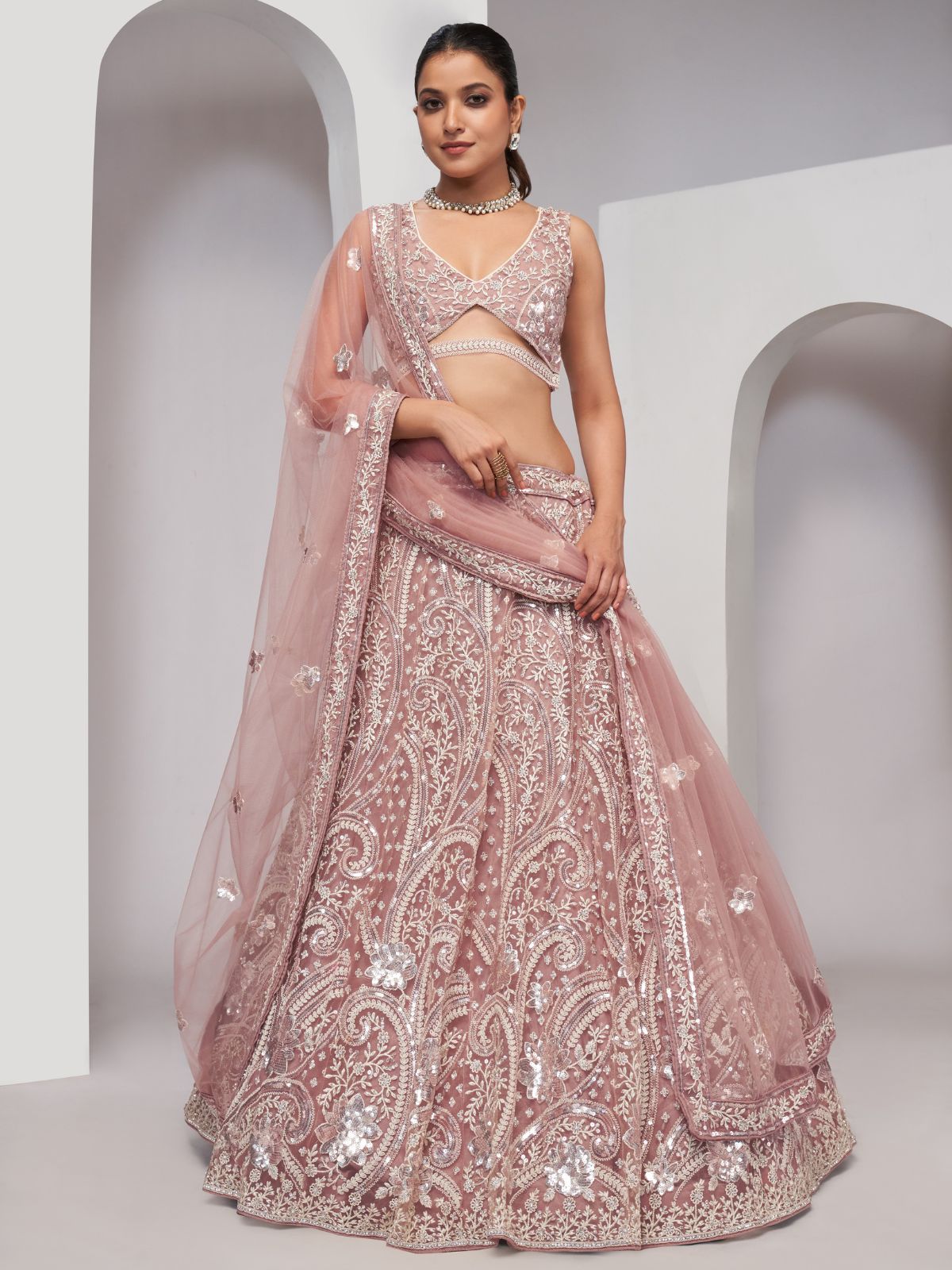 Odette Peach Soft Net Embroidered Semi Stitched Lehenga With Unstitched Blouse For Women