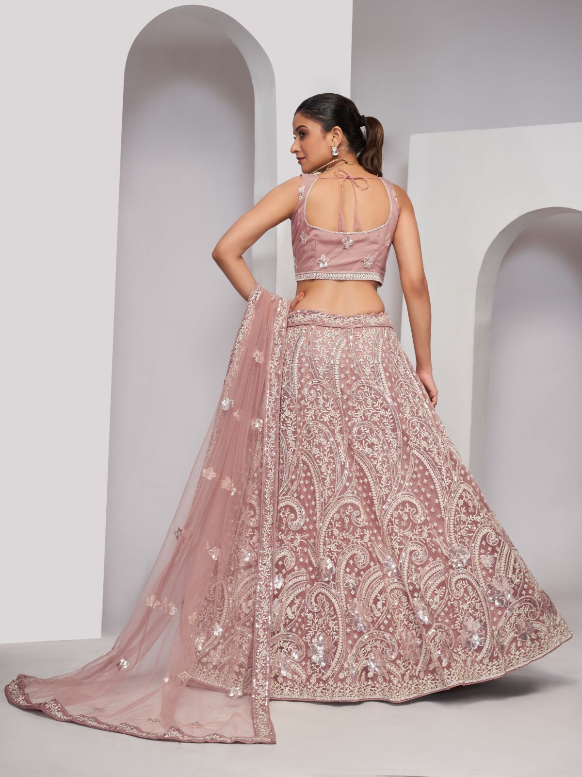 Odette Peach Soft Net Embroidered Semi Stitched Lehenga With Unstitched Blouse For Women