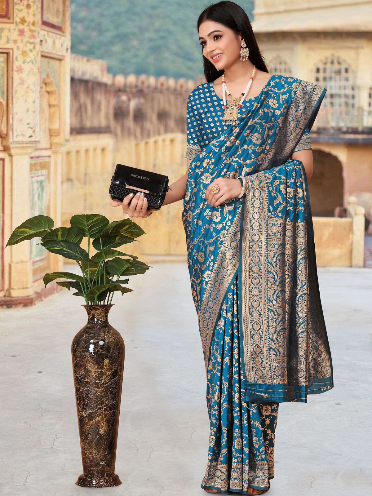 Odette Teal Woven Banarasi Silk Saree With unstitched Blouse For Women