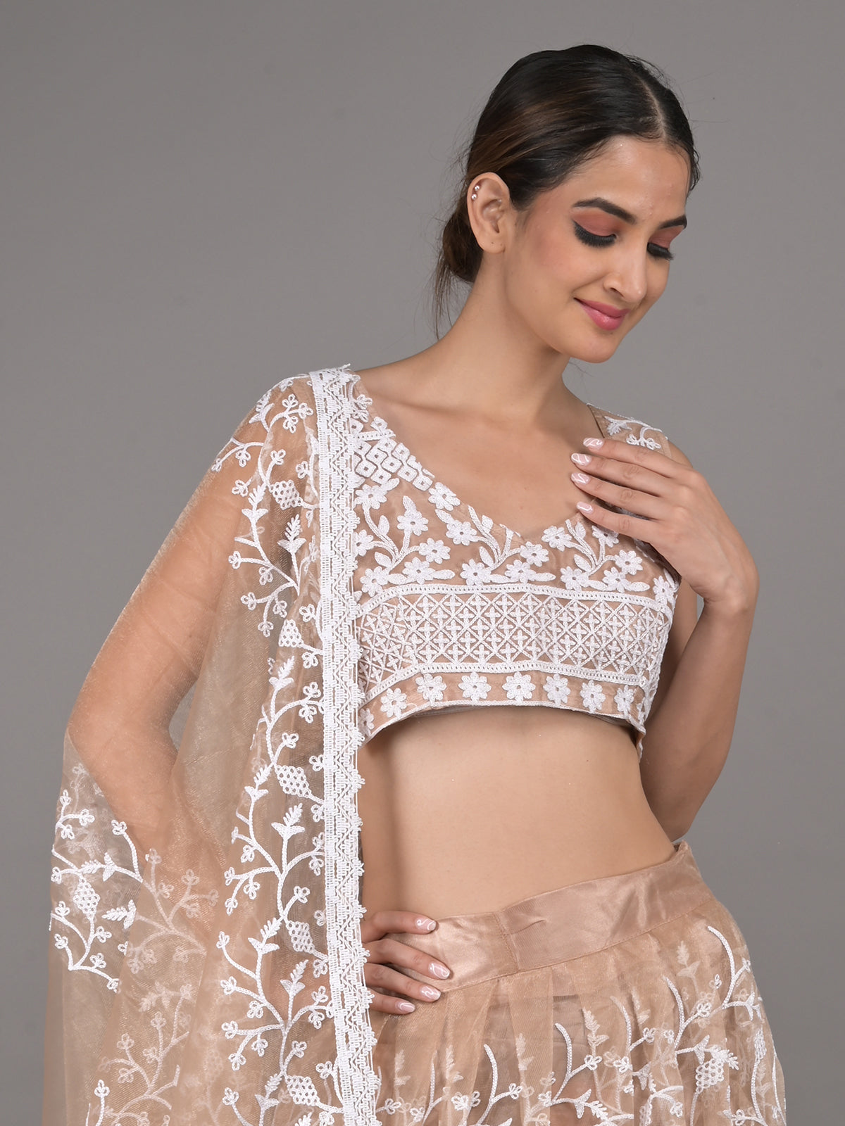 Odette Beige Embroidered Stitched Net Lehenga Set For Women