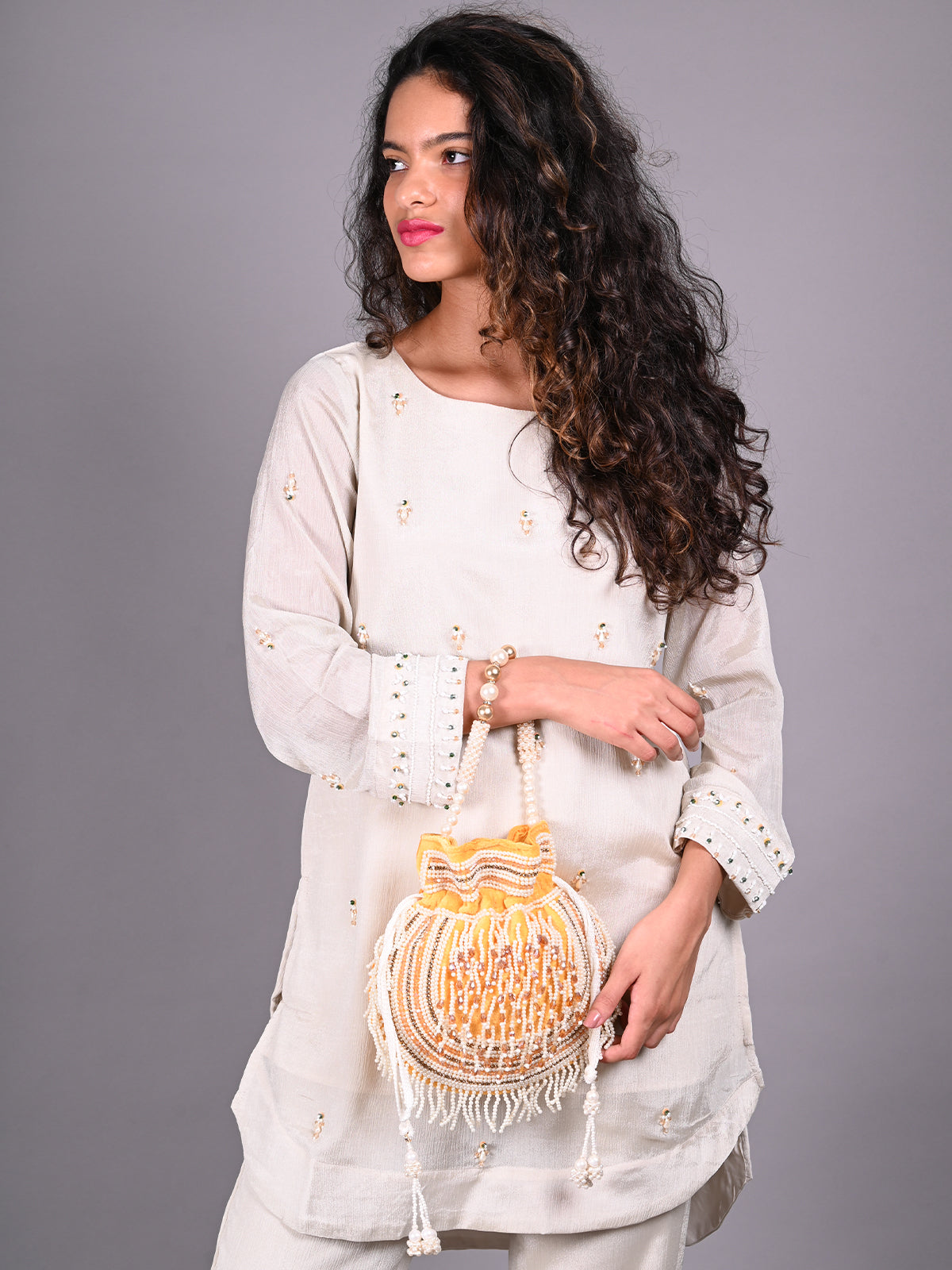 Odette Yellow Embroidered Potli Bag For Women