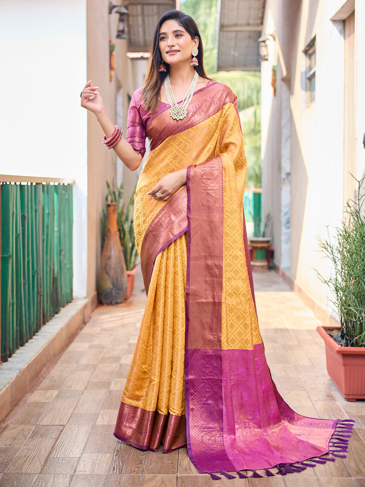 Odette Women's Yellow Silk Saree with unstitched Blouse