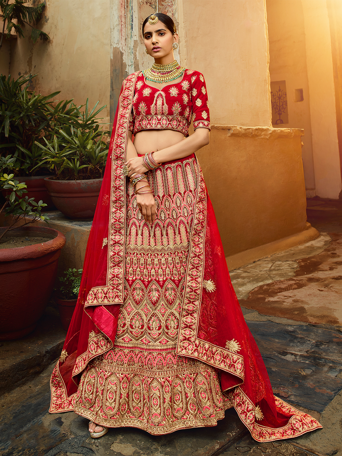 Red Embroidered Velvet Semi Stitched Lehenga With Unstitched Blouse
