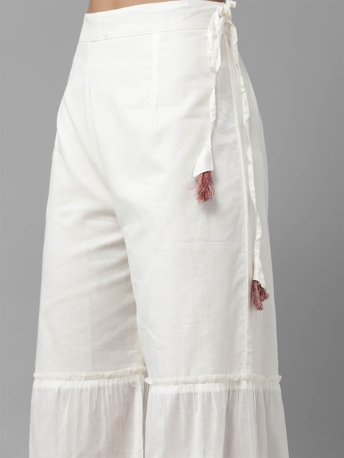 Odette Women White Solid Straight Stitched Kurta With Schiffli Trouser Set