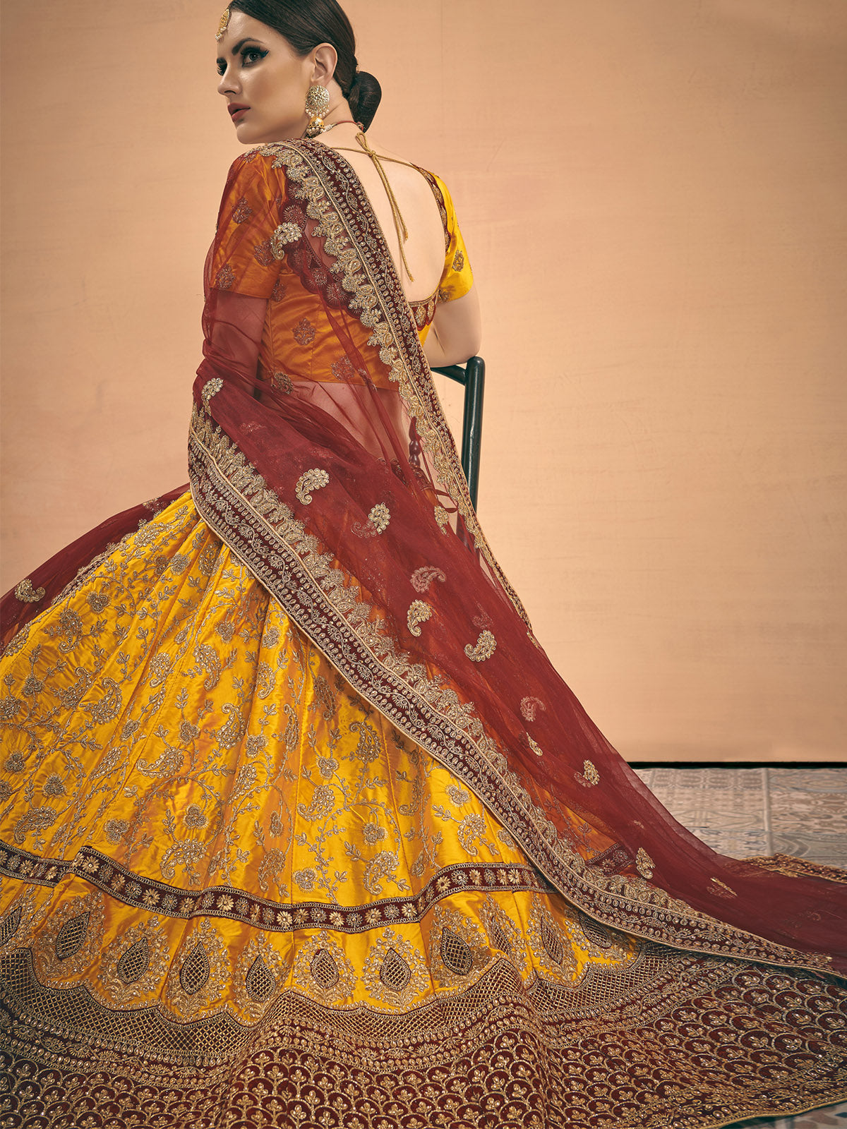Odette Women Mustard Embroidered Bridal Semi Stitched Lehenga With Unstitched Blouse