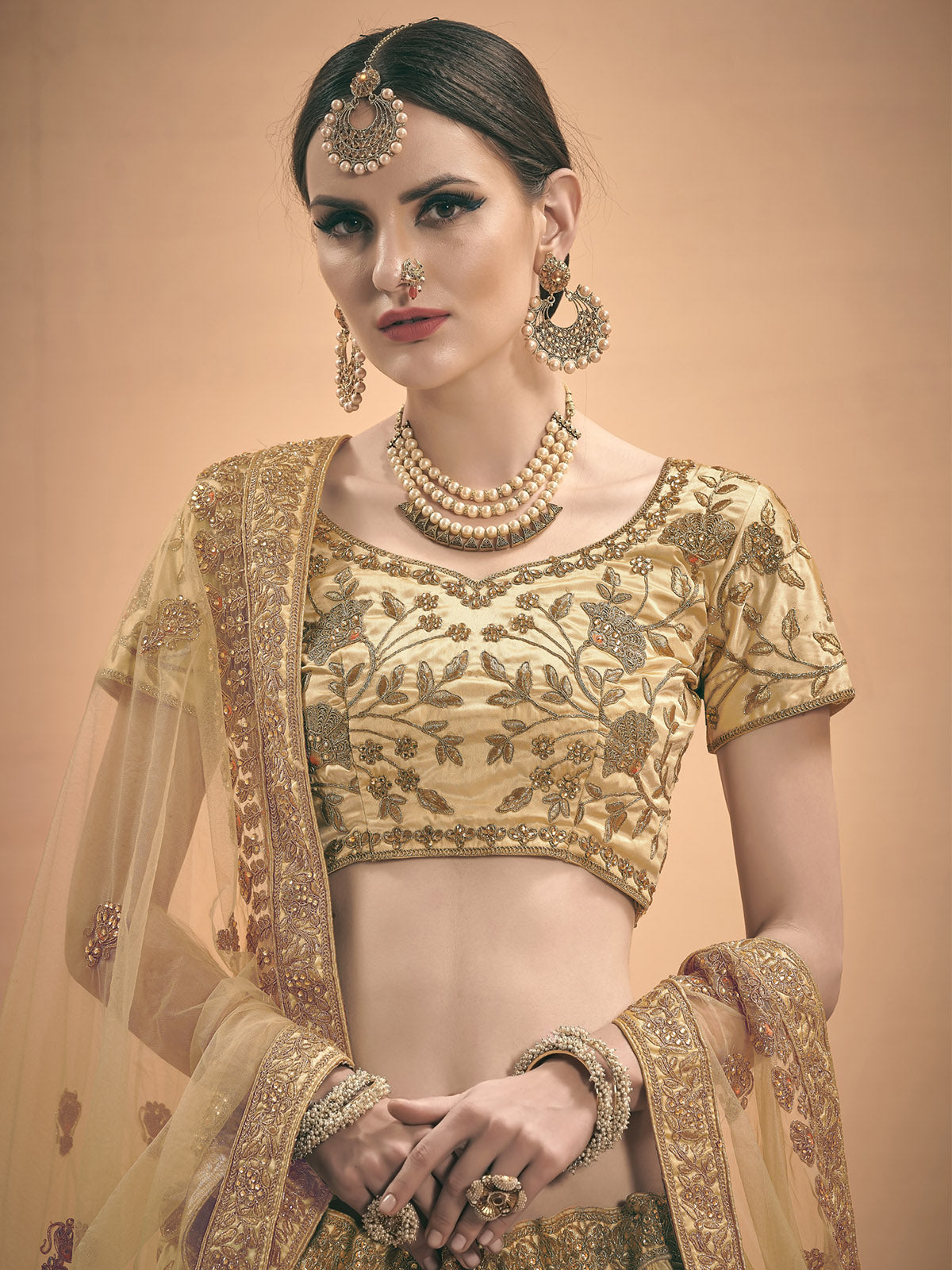 Odette Women Beige Embroidered Bridal Semi Stitched Lehenga With Unstitched Blouse