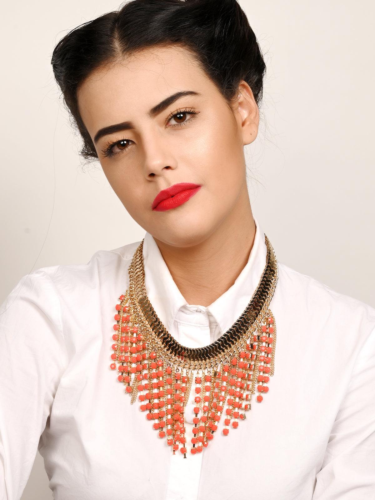 Chunky gold metallic fringe necklace with red stone droppings - Odette