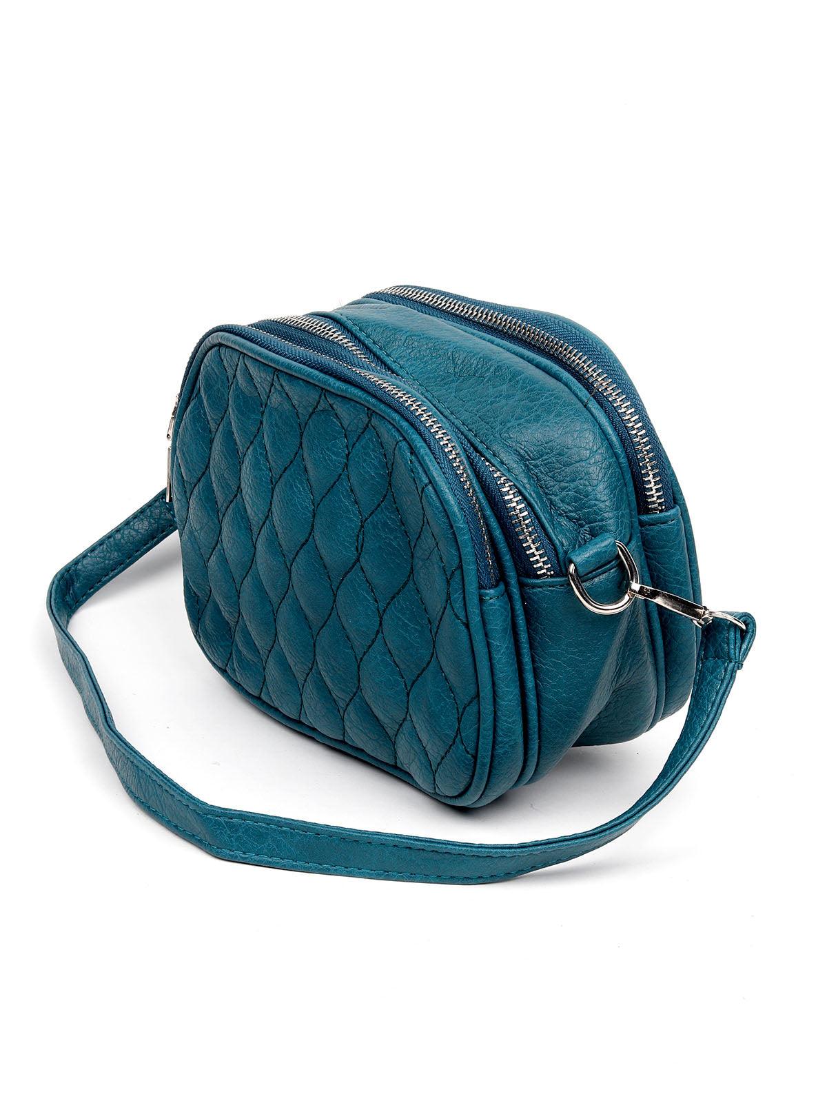 Classic blue textured sling bag for women - Odette