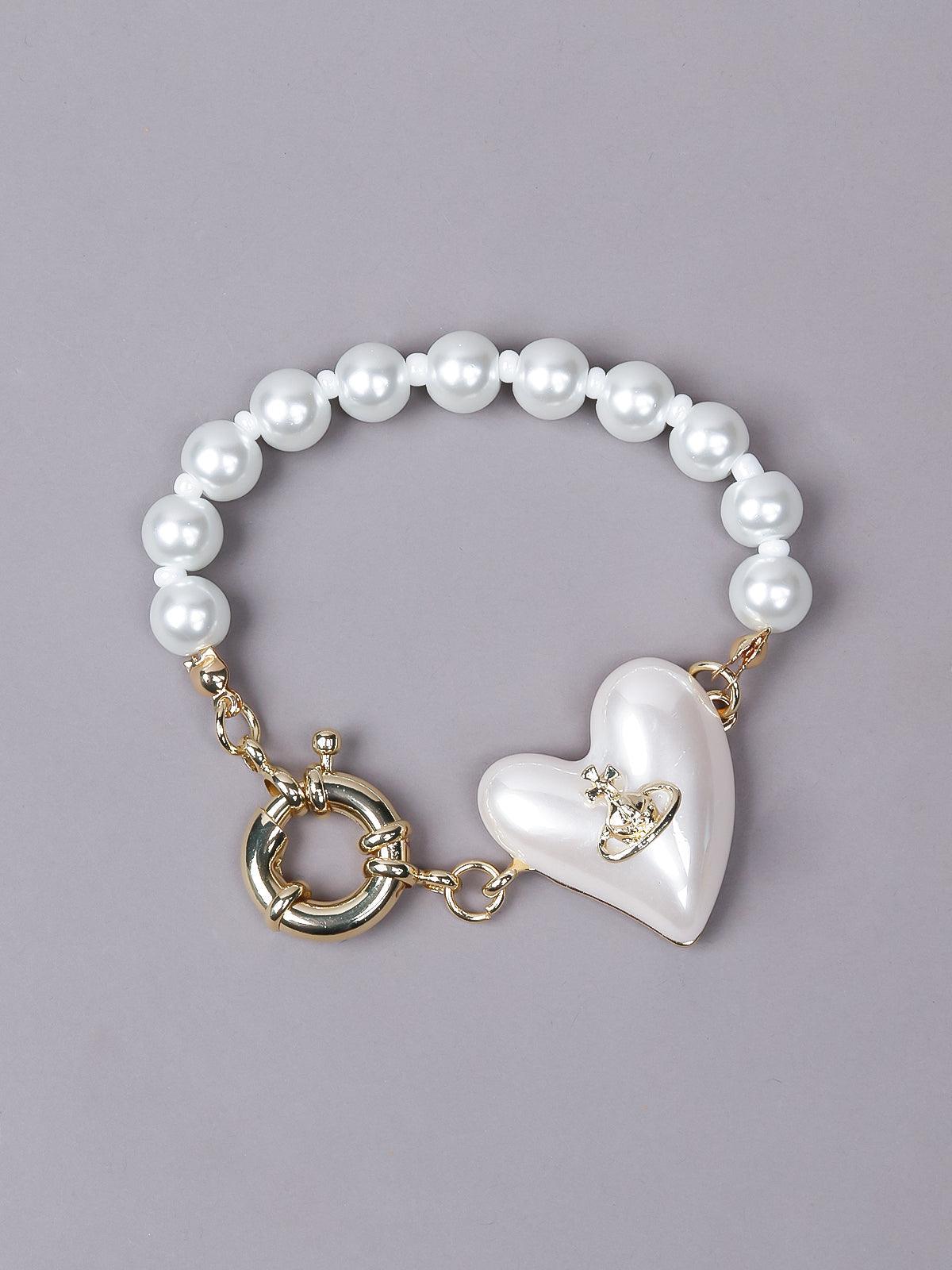 Cute pearl embellished with a heart bracelet - Odette