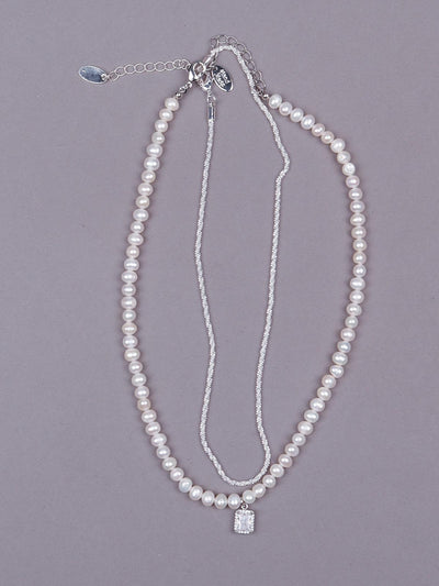 Designer pearl necklace embellished with a crystal pendant - Odette