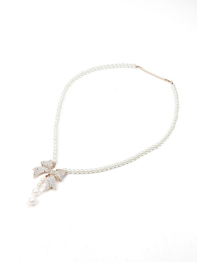 Elegant white necklace with studded bow pendant - Odette