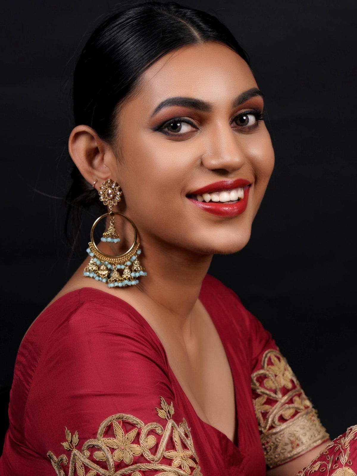 Choosing to wear RED SAREE WITH CAPE completed by the stunning earrings as  well as striking hair glossing their way to your face, is all… | Instagram